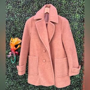 Beat the chill in style with this lightweight wool coat!